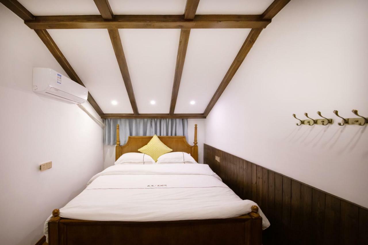 Fenghuang Slowly Time Inn Экстерьер фото