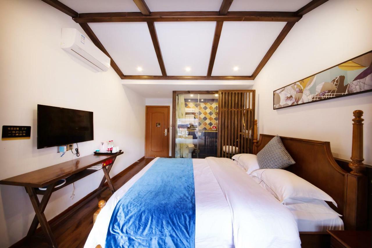 Fenghuang Slowly Time Inn Экстерьер фото
