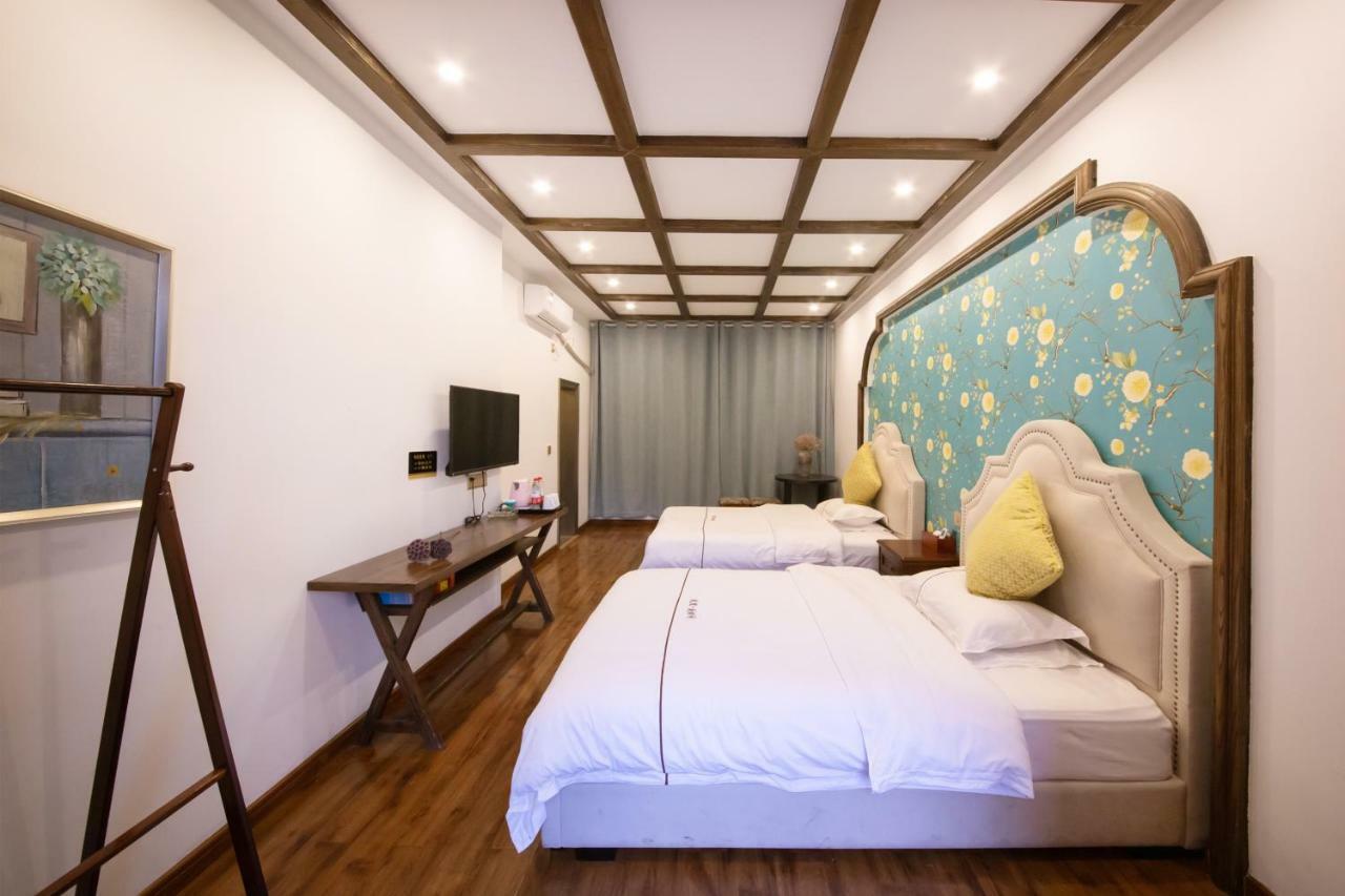 Fenghuang Slowly Time Inn Экстерьер фото