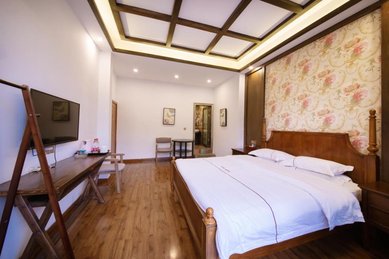 Fenghuang Slowly Time Inn Экстерьер фото